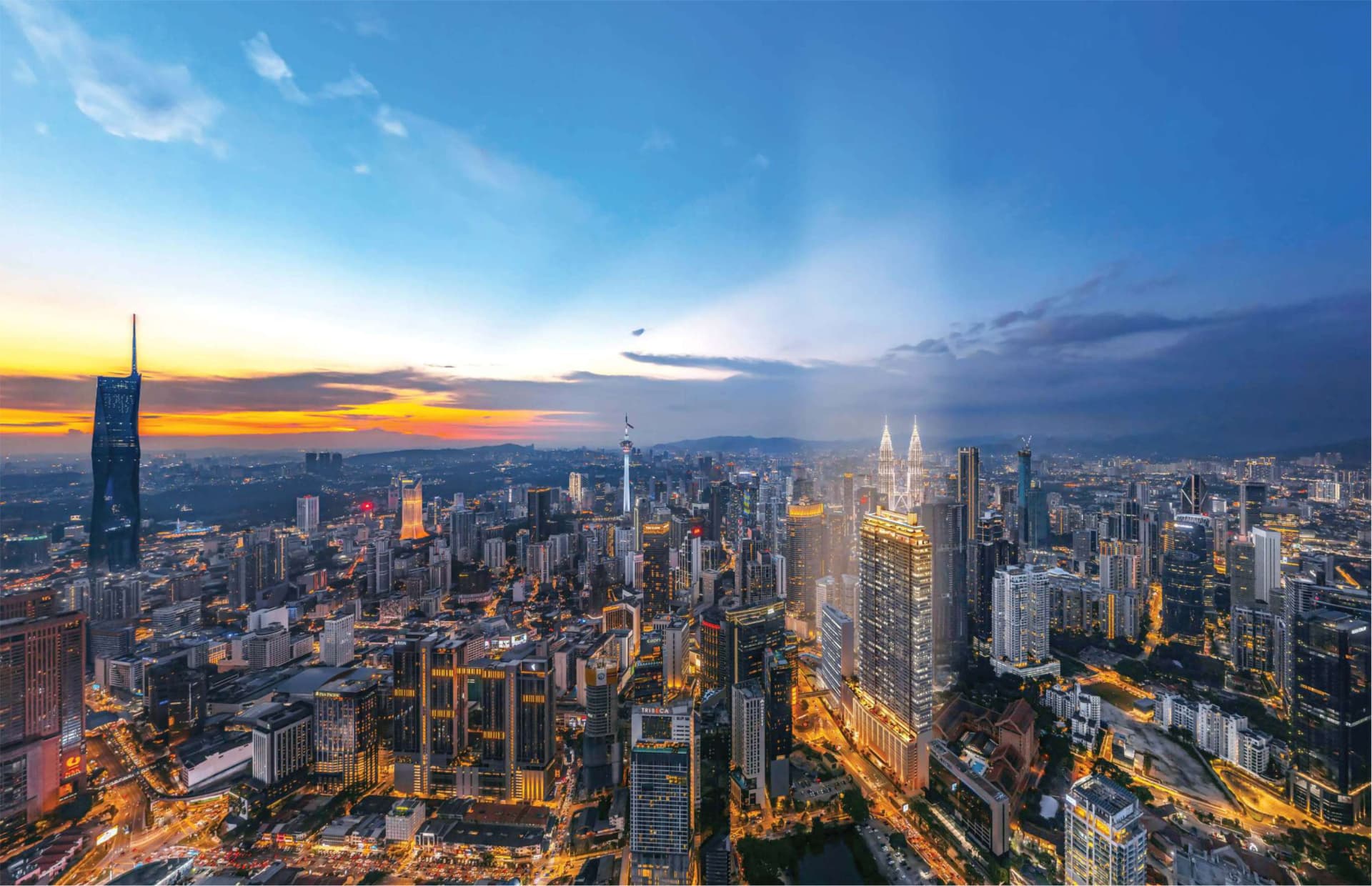 Kuala Lumpur skyline at dusk surrounding Pavilion Square in the Golden Triangle